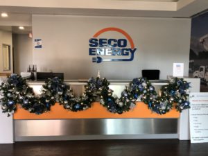 SECO Corp front desk lit garland